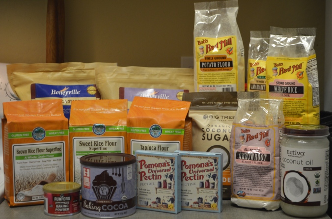 Image is packages of alternative flours, sugars, and gluten free baking products